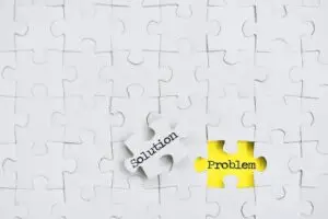 Puzzle pieces finding a solution concept - finding the answer to problems, yellow
